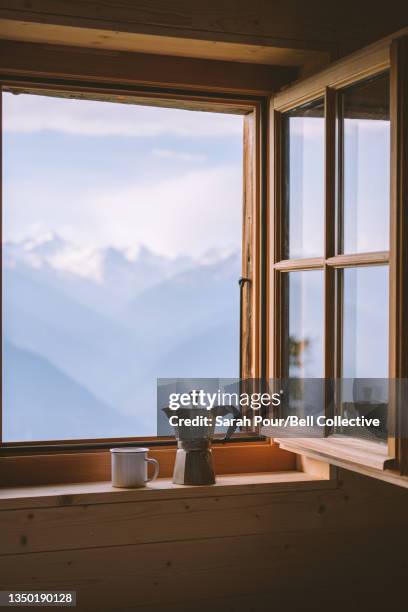 Coffee by the window in the mountains