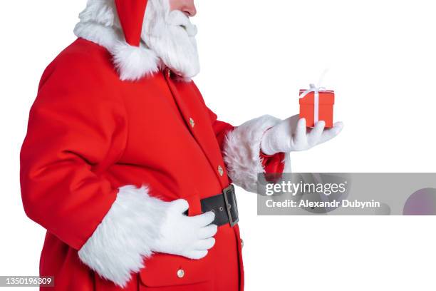 santa claus with small red gift on white background - guy isolated holding a small box in his hand imagens e fotografias de stock