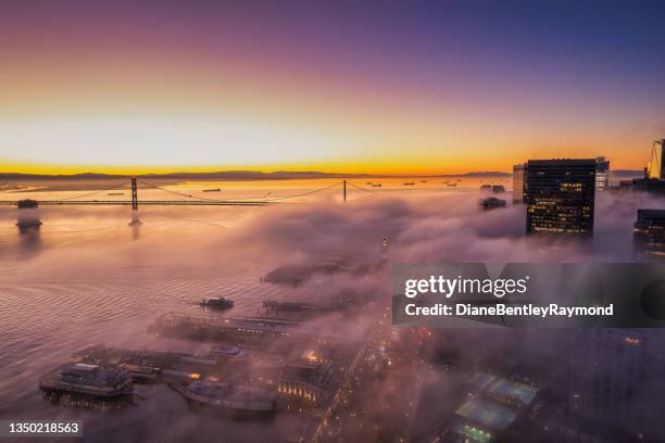 aerial view of fog over embarcadero - san francisco bay stock pictures, royalty-free photos & images