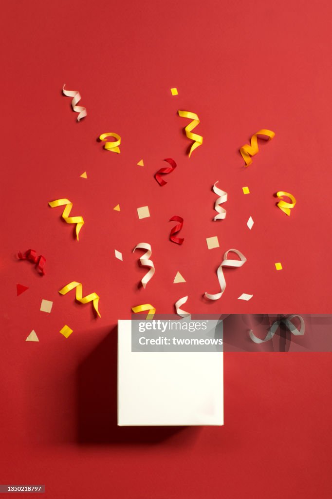 Box with exploding confetti.