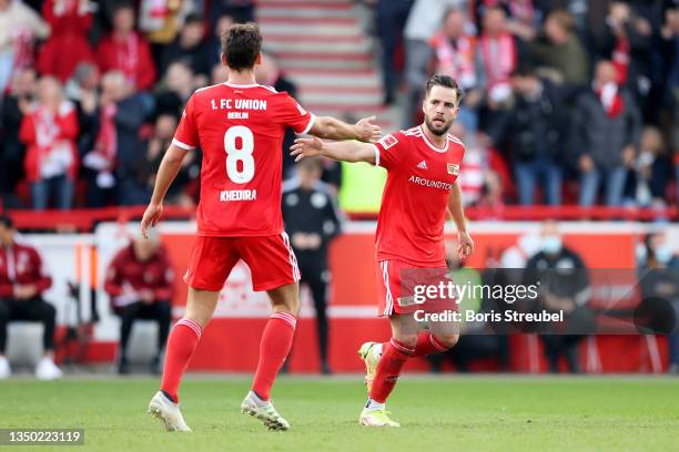 Niko Giesselmann of 1.FC Union Berlin celebrates scoring his sides first goal with Rani Khedira of 1.FC Union Berlin during the Bundesliga match...