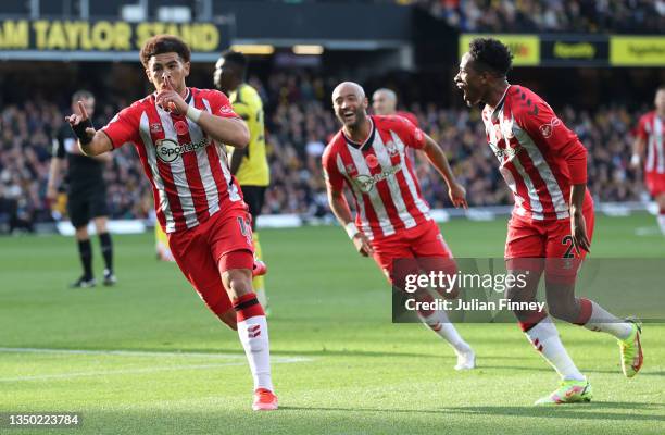 Che Adams of Southampton celebrates after scoring their team's first goal during the Premier League match between Watford and Southampton at Vicarage...