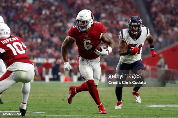 Running back James Conner of the Arizona Cardinals scores a touchdown during the game against the Houston Texans at State Farm Stadium on October 24,...