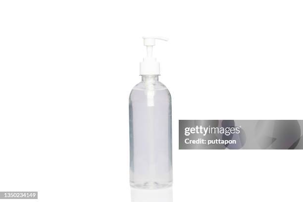 alcohol bottle spray isolated with clipping path. covid-19 concept - rubbing alcohol stock-fotos und bilder