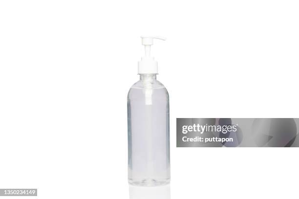 alcohol bottle spray isolated with clipping path. covid-19 concept - rubbing alcohol stock pictures, royalty-free photos & images