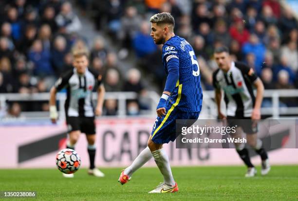 Jorginho of Chelsea scores his sides third goal from a penalty during the Premier League match between Newcastle United and Chelsea at St. James Park...
