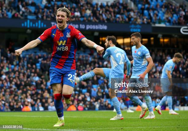Conor Gallagher of Crystal Palace celebrates after scoring their team's second goal during the Premier League match between Manchester City and...