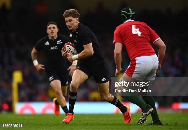 Jordie Barrett of New Zealand takes on Adam Beard of Wales during the Autumn International match between Wales and New Zealand at Principality...
