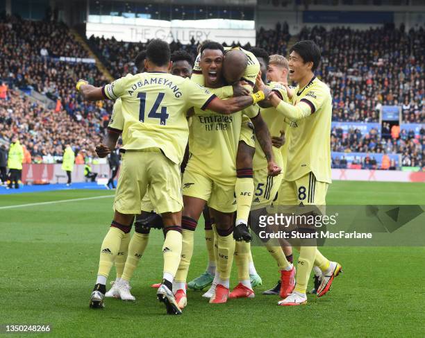 Gabriel celebrates scoring the 1st Arsenal goal with Pierre-Emerick Aubameyang Alex Lacazette and Takehiro Tomiyasu during the Premier League match...