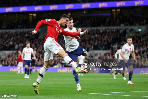 Cristiano Ronaldo of Manchester United scores their team's first goal during the Premier League match between Tottenham Hotspur and Manchester United...