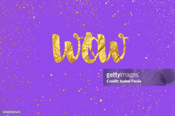 "wow" sign in golden words - confetti explosion stock-fotos und bilder