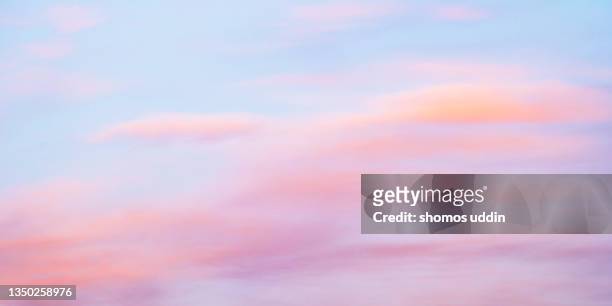 panoramic view of soft pink and blue colour sky at sunset - clouds stock pictures, royalty-free photos & images