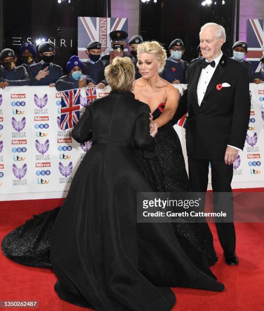 Sharon Stone, Hannah Waddingham and Hannah's father attend the Pride Of Britain Awards 2021 at The Grosvenor House Hotel on October 30, 2021 in...