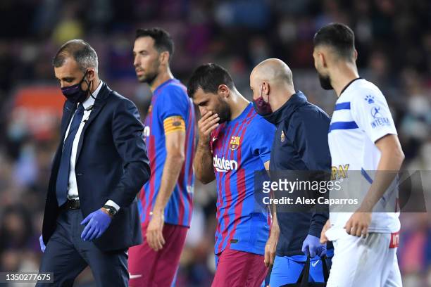 Sergio Aguero of FC Barcelona looks dejected as he leaves the pitch after picking up an injury during the LaLiga Santander match between FC Barcelona...