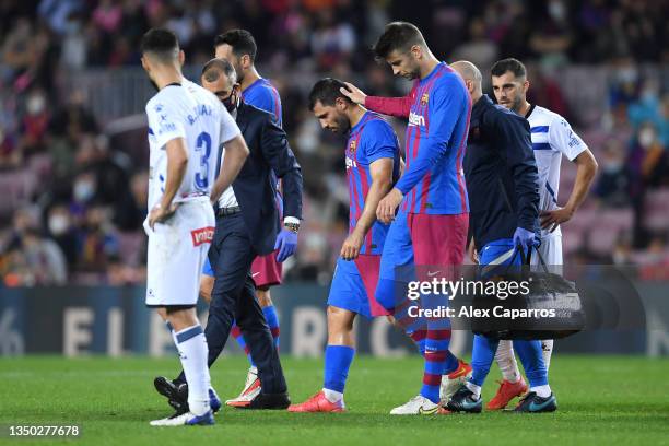 Sergio Aguero of FC Barcelona looks dejected as he leaves the pitch after picking up an injury during the LaLiga Santander match between FC Barcelona...