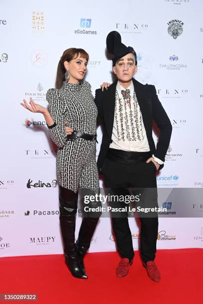 Frédérique Bel and Ali Mahdavi attend the photocall during the Global Gift Gala 2021 at Four Seasons Hotel George V on October 30, 2021 in Paris,...