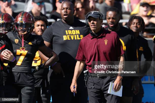 Head coach Herm Edwards of the Arizona State Sun Devils watches from the sidelines during the first half of the NCAAF game against the Washington...
