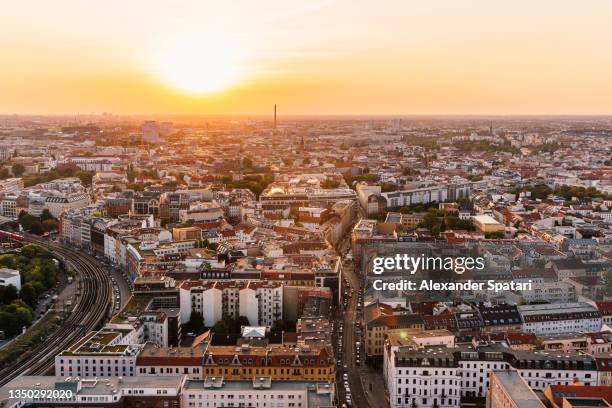 berlin cityscape at sunset, germany - berlin luftaufnahme stock-fotos und bilder