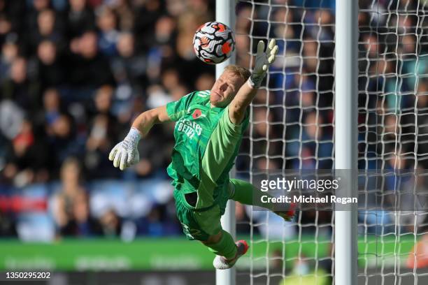 Aaron Ramsdale of Arsenal makes a save from a James Maddison free kick during the Premier League match between Leicester City and Arsenal at The King...