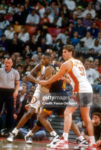 Jon Koncak of the Atlanta Hawks in action against the Indiana Pacers during an NBA basketball game circa 1993 at the Omni Coliseum in Atlanta,...