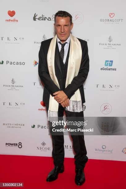 Benjamin Castaldi attends the photocall during the Global Gift Gala 2021 at Four Seasons Hotel George V on October 30, 2021 in Paris, France.