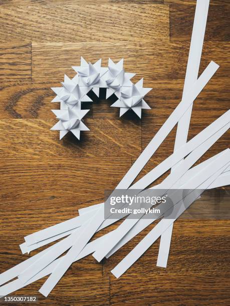 making paper wreath using origami froebel star - youtube star stock pictures, royalty-free photos & images