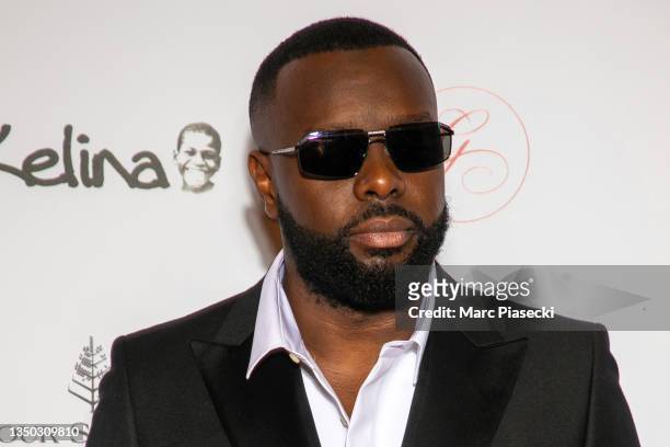 Singer Gims attends the photocall during the Global Gift Gala 2021 at Four Seasons Hotel George V on October 30, 2021 in Paris, France.
