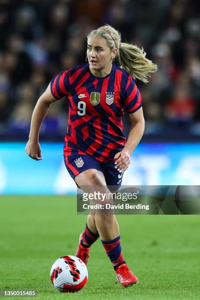 Lindsey Horan of United States dribbles the ball against Korea Republic in the first half of the game at Allianz Field on October 26, 2021 in St...