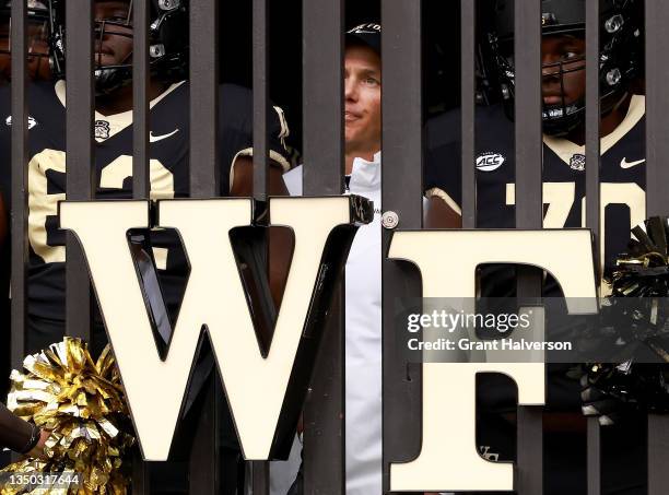 Head coach Dave Clawson of the Wake Forest Demon Deacons waits to take the field for a game against the Duke Blue Devils at Truist Field on October...