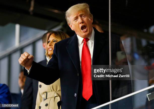 Former president of the United States Donald Trump waves prior to Game Four of the World Series between the Houston Astros and the Atlanta Braves...