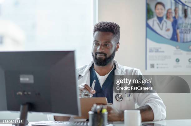 meeting patients virtually - doctor on computer stock pictures, royalty-free photos & images