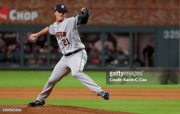 Zack Greinke of the Houston Astros delivers the pitch against the Atlanta Braves in Game Four of the World Series at Truist Park on October 30, 2021...