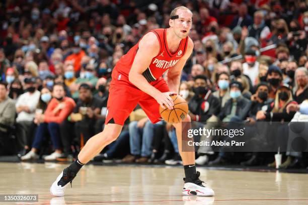 Cody Zeller of the Portland Trail Blazers handles the ball against the LA Clippers during the fourth quarter at Moda Center on October 29, 2021 in...