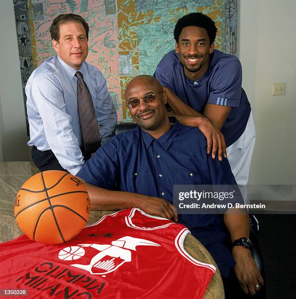 Agent Arn Tellem poses for a portrait with client guard Kobe Bryant of the Los Angeles Lakers and Bryant's father, former NBA player Joe "Jellybean"...