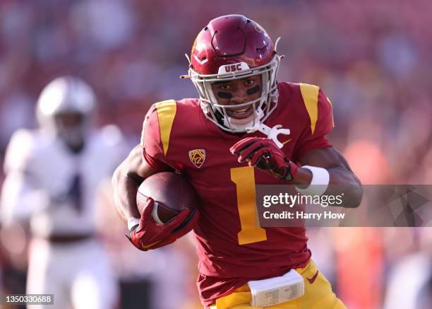 Gary Bryant Jr. #1 of the USC Trojans reacts as scores a touchdown on his catch, to take a 14-7 lead over the Arizona Wildcats, during the first half...