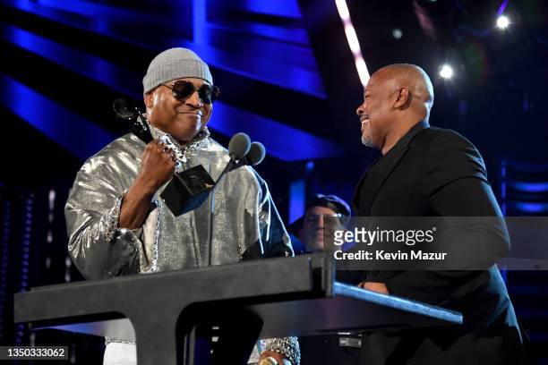 Dr. Dre presents LL Cool J with the Musical Excellence Award onstage during the 36th Annual Rock & Roll Hall Of Fame Induction Ceremony at Rocket...