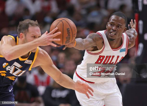 Javonte Green of the Chicago Bulls steals the ball from Bojan Bogdanovic of the Utah Jazz at the United Center on October 30, 2021 in Chicago,...