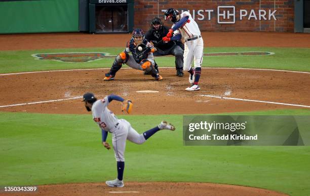 Dansby Swanson of the Atlanta Braves hits a solo home run against Cristian Javier of the Houston Astros during the seventh inning in Game Four of the...