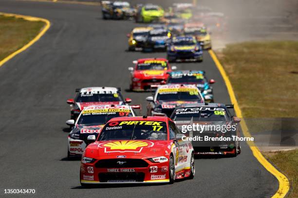 Will Davison driver of the Shell V-Power Racing Ford Mustang leads the field in Race 21 during the Sydney SuperNight which is part of the 2021...