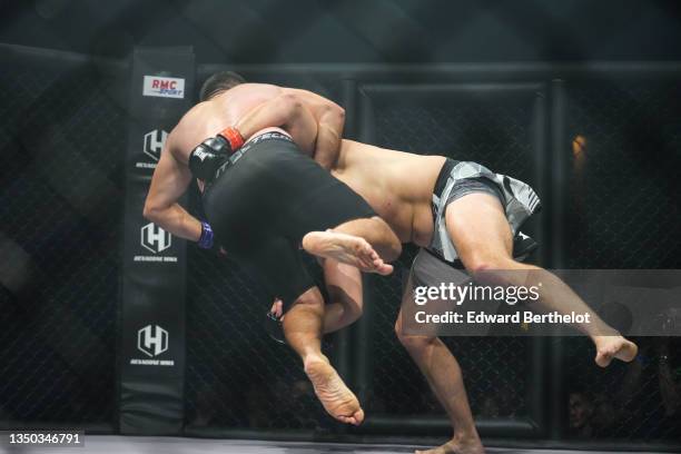 Damien Losco performs a double leg takedown against Giorgi Khubejashvili during the Mixed Martial Arts event "Hexagone MMA 2" at Zenith de La...