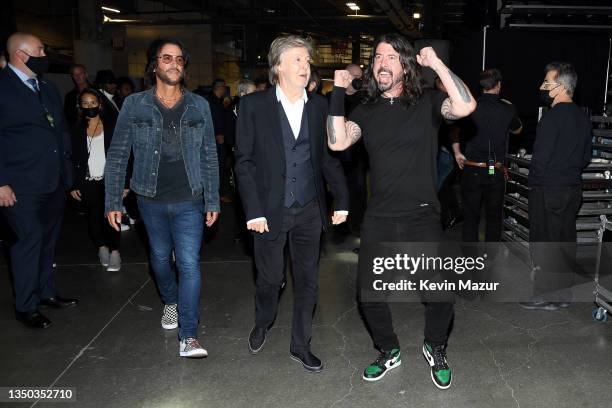 Rami Jaffee, Paul McCartney, and Dave Grohl speak backstage during the 36th Annual Rock & Roll Hall Of Fame Induction Ceremony at Rocket Mortgage...