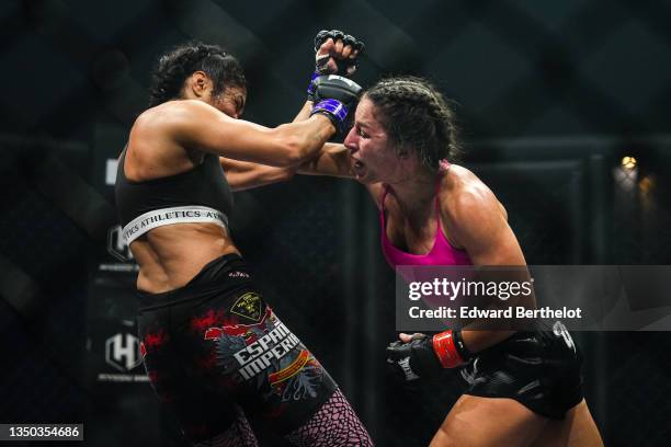 Lucie Bertaud and Karla Benitez trade punches during the Mixed Martial Arts fights event "Hexagone MMA 2" at Zenith de La Villette, on October 30,...