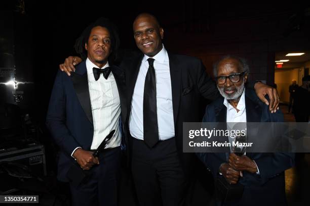 Jay-Z, Jon Platt, and Clarence Avant pose backstage during the 36th Annual Rock & Roll Hall Of Fame Induction Ceremony at Rocket Mortgage Fieldhouse...