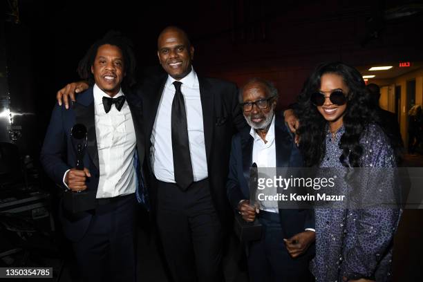 Jay-Z, Jon Platt, Clarence Avant, and H.E.R. Pose backstage during the 36th Annual Rock & Roll Hall Of Fame Induction Ceremony at Rocket Mortgage...