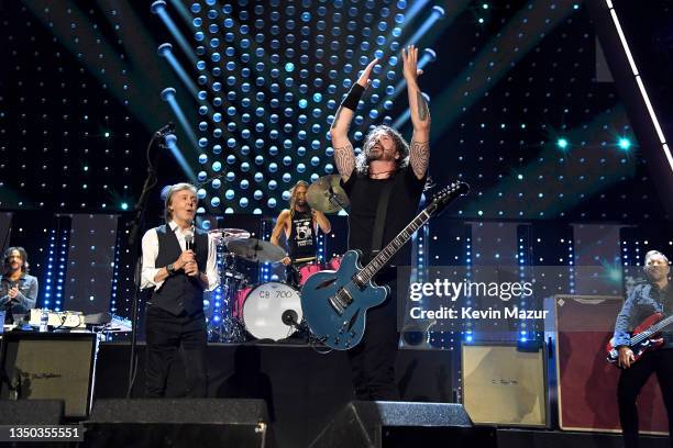 Paul McCartney and Dave Grohl of Foo Fighers perform onstage during the 36th Annual Rock & Roll Hall Of Fame Induction Ceremony at Rocket Mortgage...