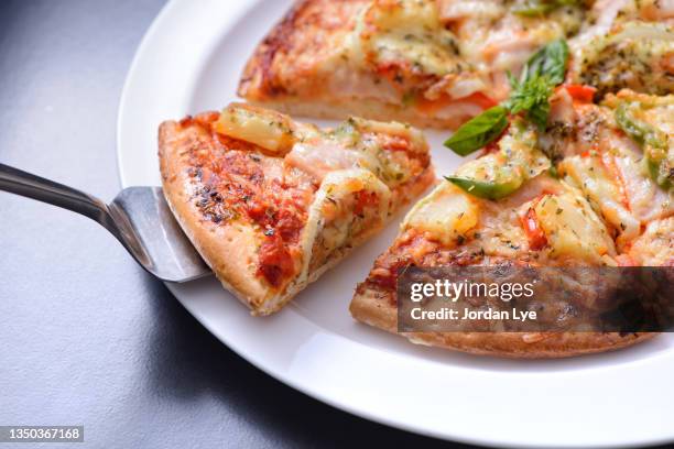 small size pizza - hawaiian pizza stock pictures, royalty-free photos & images