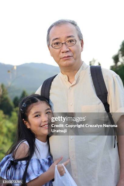 father and child bonding quality time embrace - hitachi ibaraki stock pictures, royalty-free photos & images