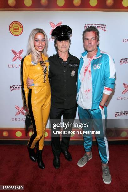 Lawrence Bender and Len Wiseman attend Darren Dzienciol's CARN*EVIL Halloween Party on October 30, 2021 in Bel Air, California.