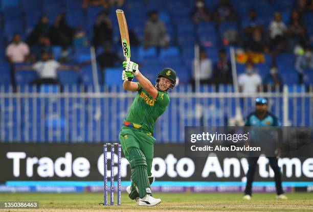 David Miller of South Africa hits out during the ICC Men's T20 World Cup match between South Africa and Sri Lanka at Sharjah Cricket Stadium on...