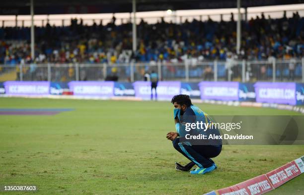 Wanindu Hasaranga of Sri Lanka cuts a dejected figure after a six in the final over during the ICC Men's T20 World Cup match between South Africa and...
